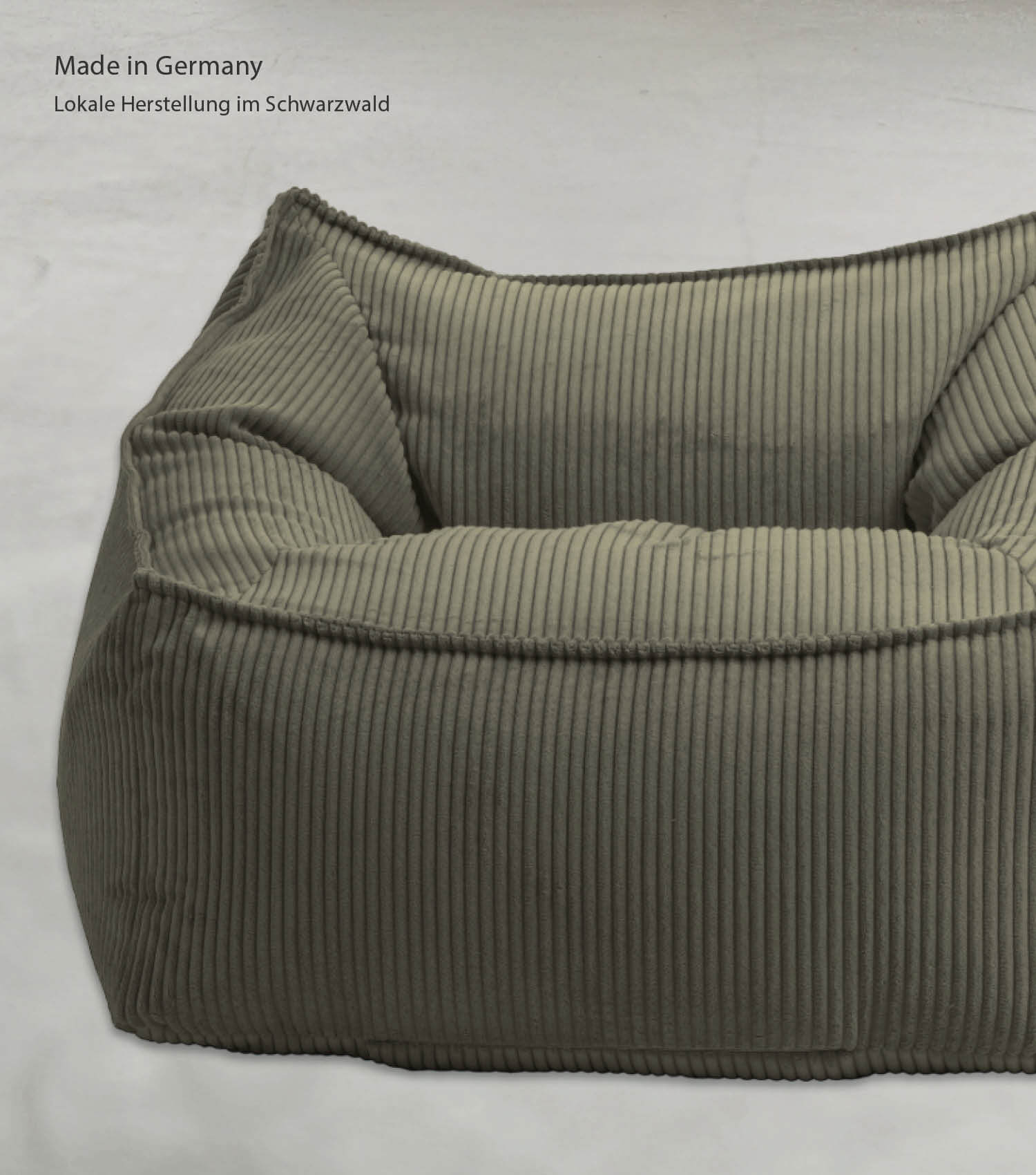 Fauteuil en velours côtelé XXL avec accoudoirs, coloris olive