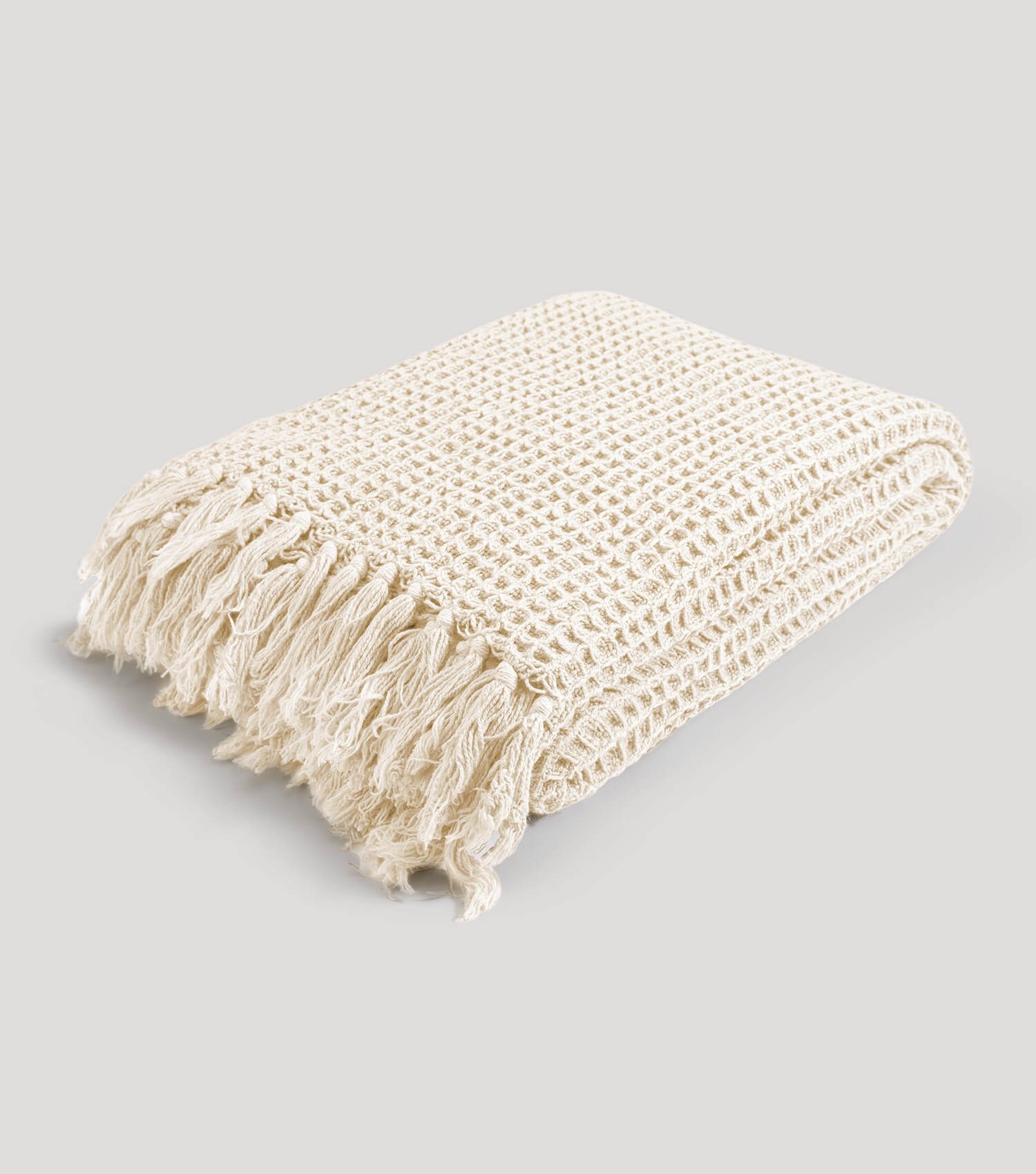 Couverture ‘Die Hyggelige’ en piqué gaufré Couverture tricotée & jet de canapé #sku_BL2waffle-081elfenbein